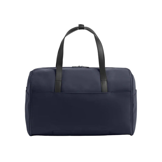 A navy blue duffel bag with black leather handles, shown from the front against a light gray studio background.